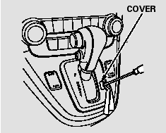 4. Insert the key in the shift lock