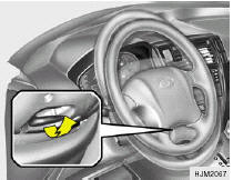 To Adjust the Steering Wheel: