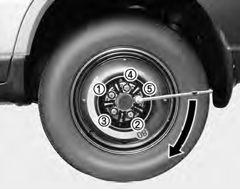 11. Once the wheel lug nuts have been tightened, lower the vehicle fully to the