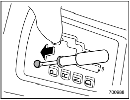 2. Remove the shift lock cover using a