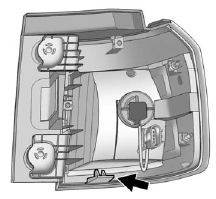 11. Verify that the taillamp assembly tab, located at the bottom of the taillamp