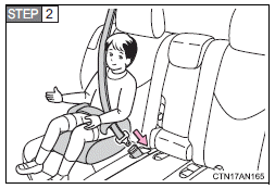 Sit the child in the booster seat.
