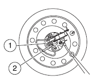 5. Use the lug wrench to remove the