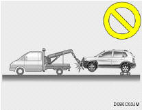 o Do not tow with sling type truck as this