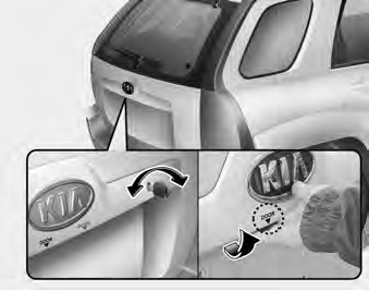 Rear hatch Opening the rear hatch • Rear hatch is locked or unlocked with a key.