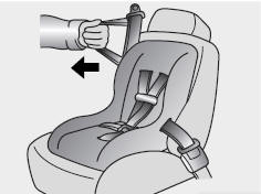 3. Pull the shoulder portion of the safety belt all the way out. When the shoulder