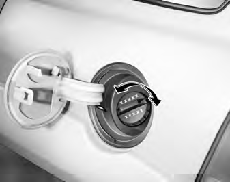 3. Pull the fuel filler lid out to open. 4. To remove the cap, turn the fuel
