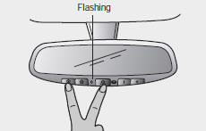 Erasing programmed HomeLink buttons To erase the three programmed buttons (individual