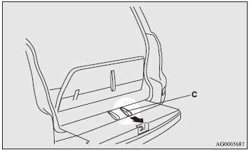 4. Pull the belt (C- black) to release the lock.