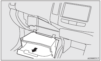 4. Remove the lower glove box fastener, and then remove the lower glove box.