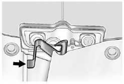 2. Move the secondary hood release lever to the right to release the striker.