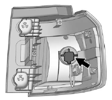 6. Turn the bulb socket counterclockwise and pull it out.