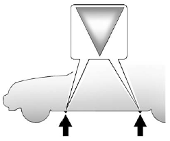 4. Position the jack lift head at the jack location nearest the flat tire. The