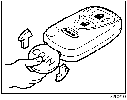 1) Put the edge of a coin or a flat blade screw driver in the slot of the transmitter