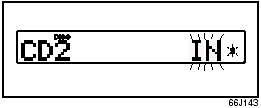 Both the indication “In” and the selected disc number in the CD indicator will