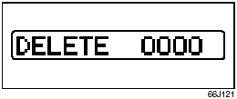 2) Press the power on/off knob (1) while pressing and holding the track up button