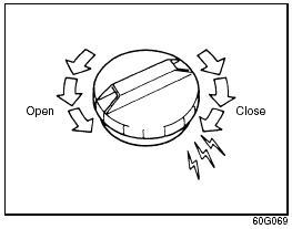 To remove the fuel filler cap: 1) Open the fuel filler door. 2) Remove the cap