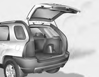 CAUTION - Rear hatch The rear hatch/window swings upward. Make sure no objects