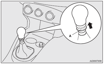 Pull up the pull-ring (A), then move the gearshift lever to the “R” (Reverse)
